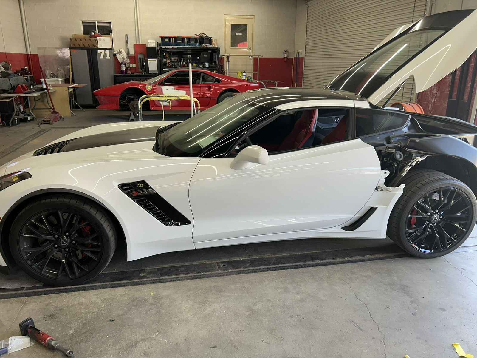 Corvette before collision repair, front-end damage